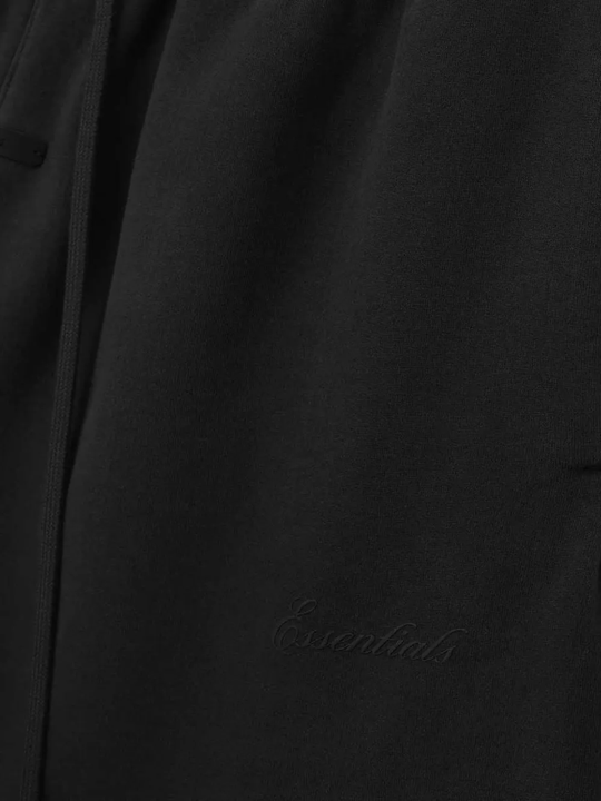 Close up of Black pants, showing texture of the cotton fabric