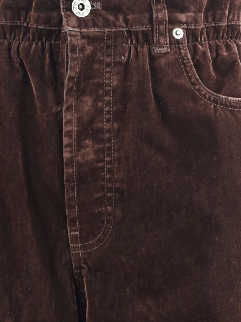 Close up of brown pants,showing texture of the cotton fabric