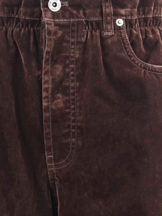Close up of brown pants,showing texture of the cotton fabric