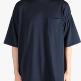 Navy t-shirt worn by a person, showing the t-shirt's fit