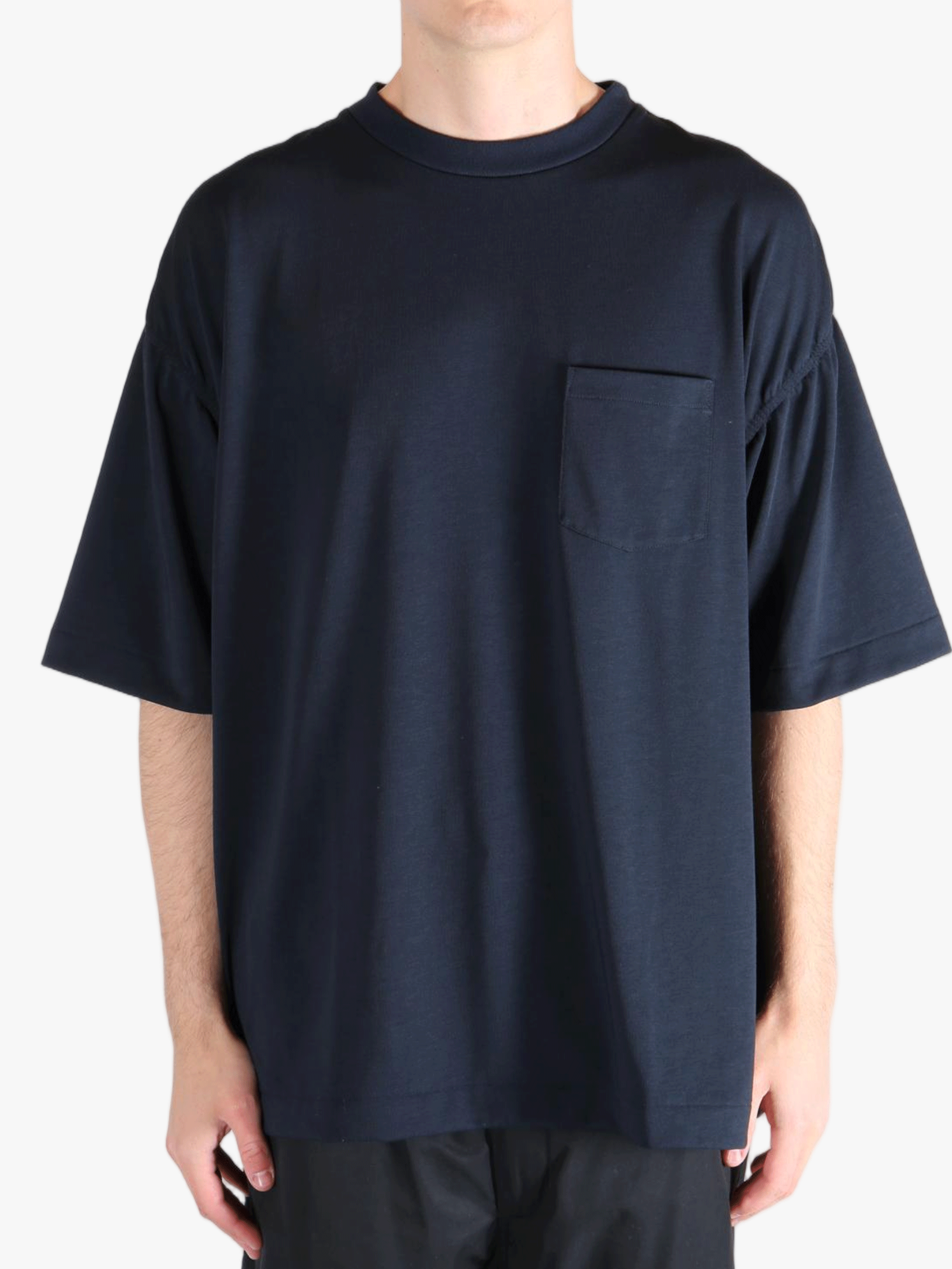 Navy t-shirt worn by a person, showing the t-shirt's fit