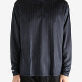 Black pullover worn by a person, showing the pullover's fit