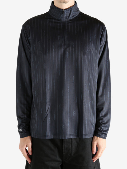 Black pullover worn by a person, showing the pullover's fit