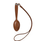 Brown accessories, front view