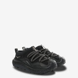 black sneakers, side view