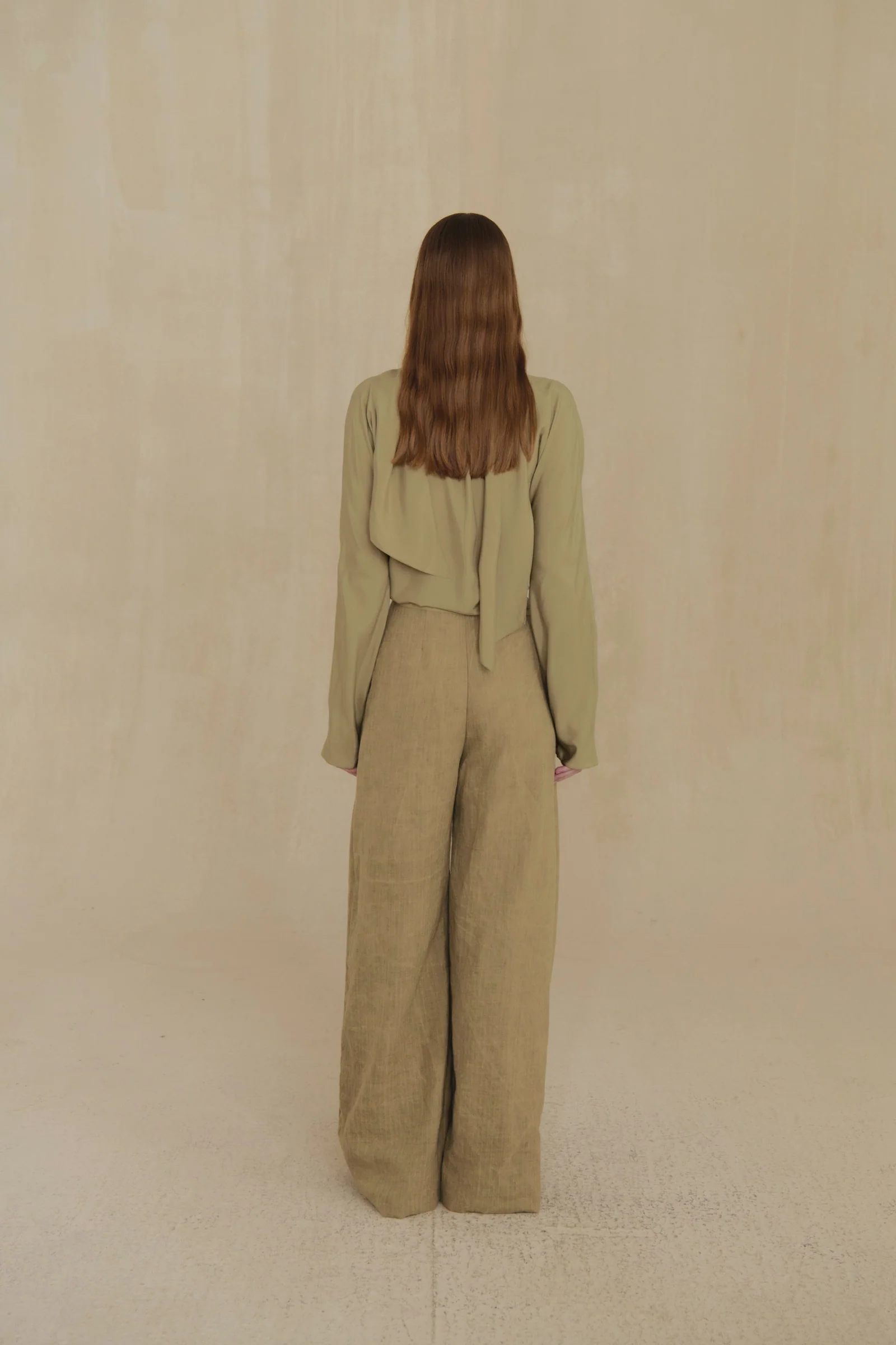 Green shirt, full body view