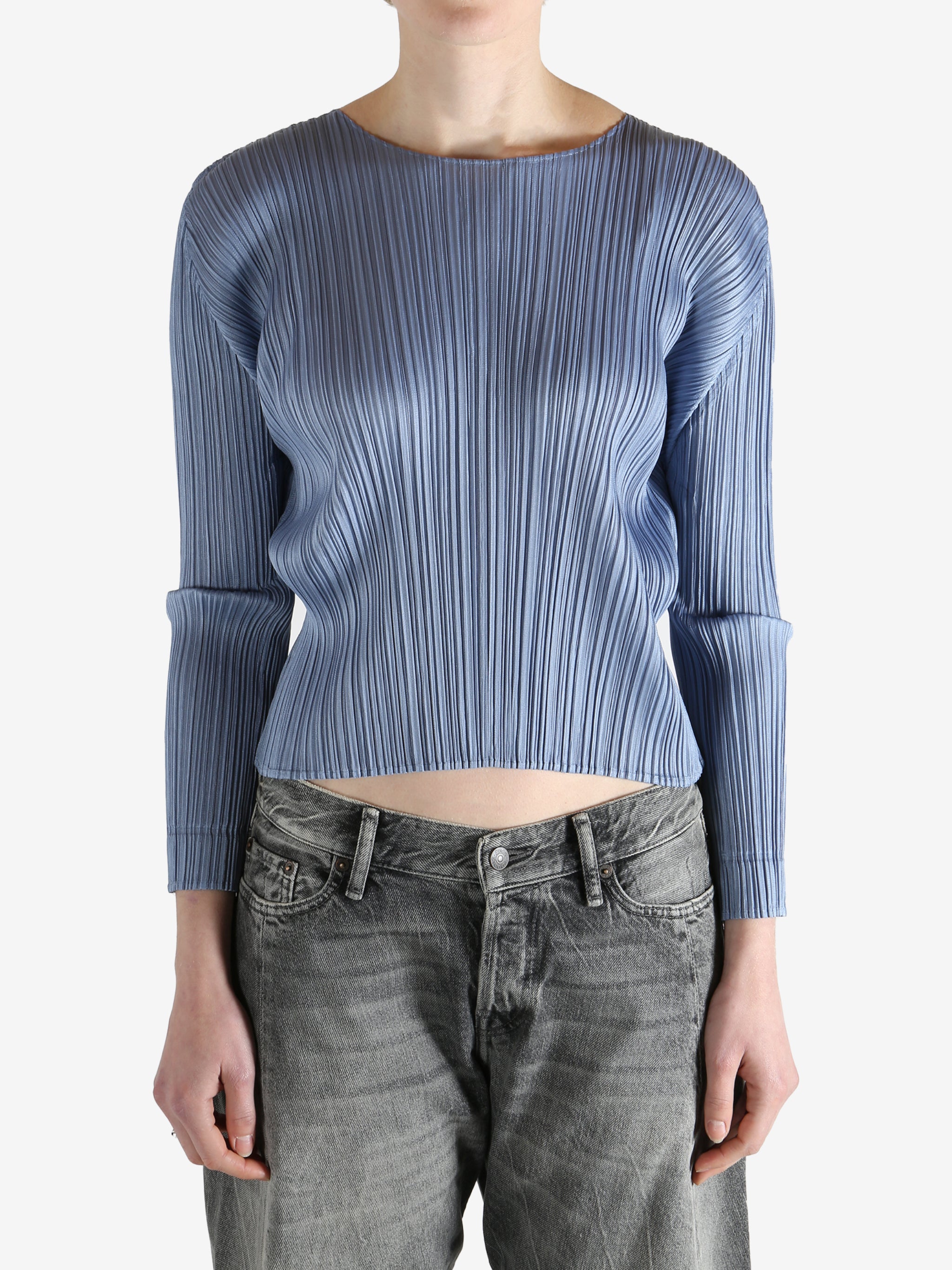 Blue top worn by a person, showing the top's fit