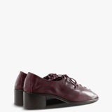 Burgundy shoes, side view