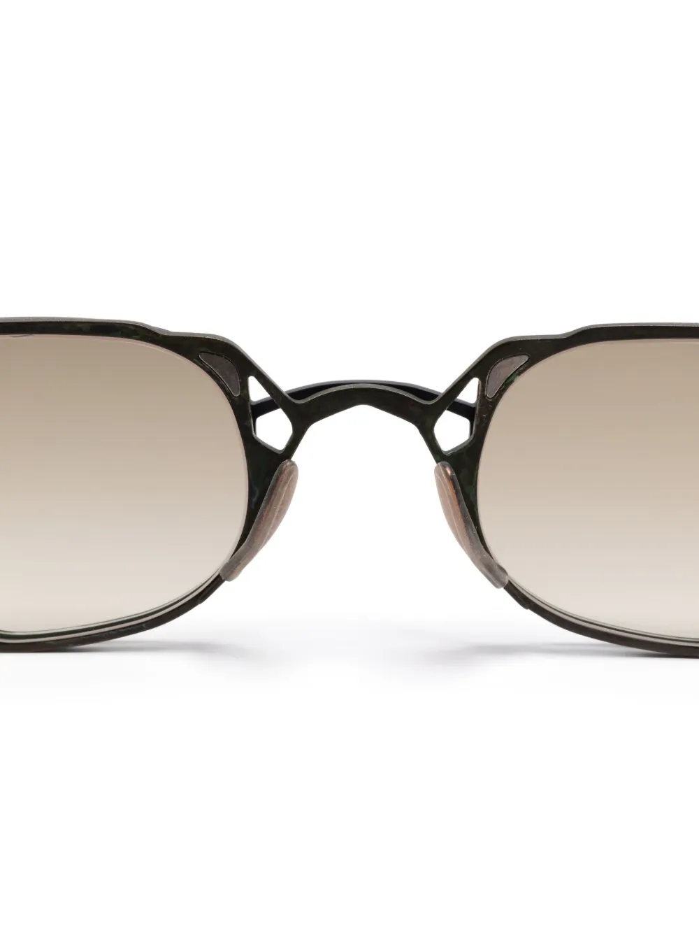 Close up of black eyewear, showing texture of the metal fabric