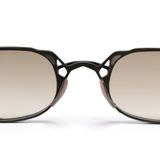 Close up of black eyewear, showing texture of the metal fabric