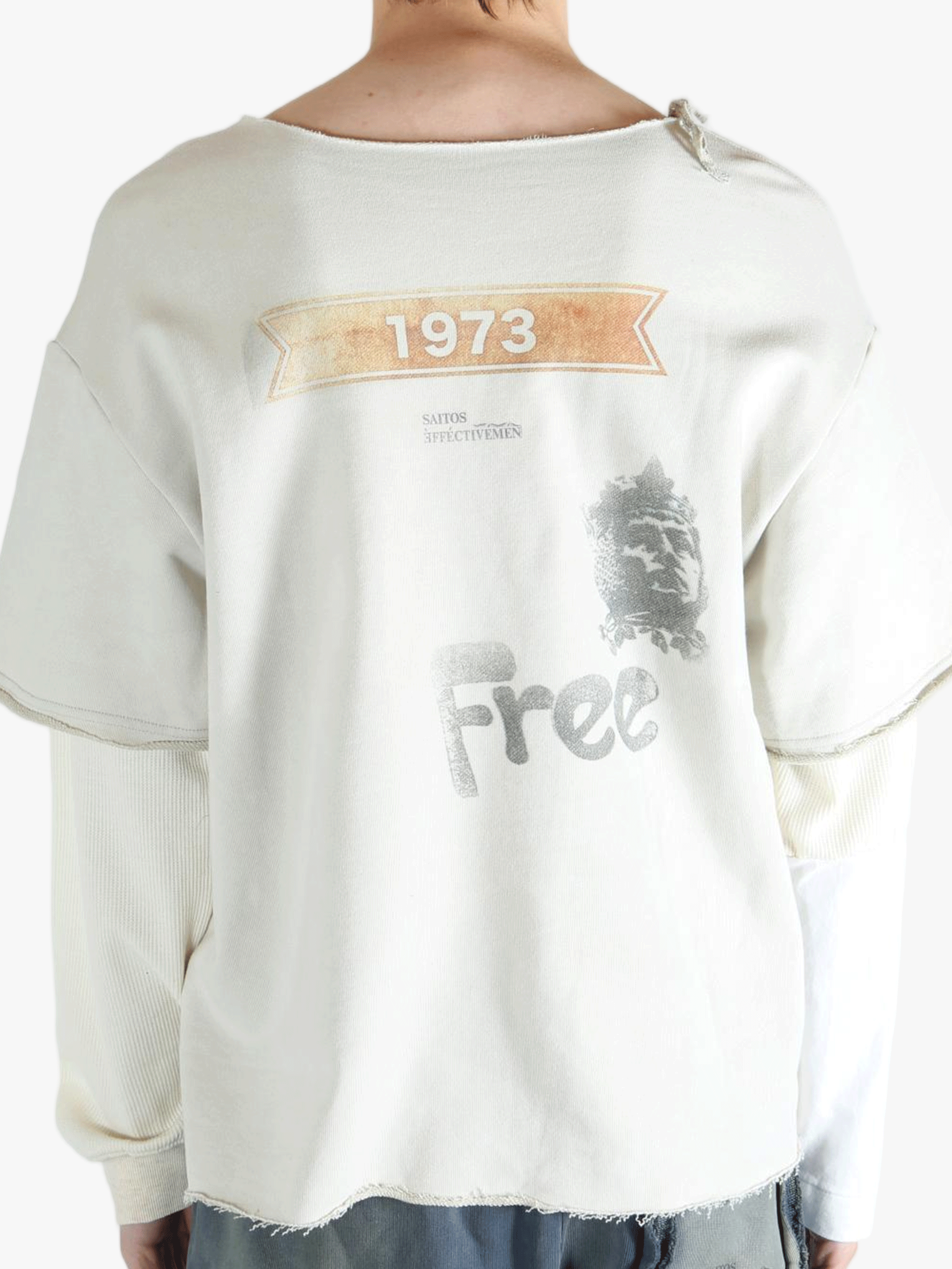 White shirt worn by a person, showing the shirt's fit