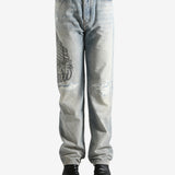 Blue jeans worn by a person, showing the jeans fit