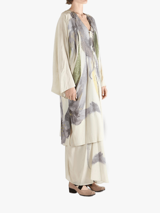 Tan top worn by a person, showing the top's fit