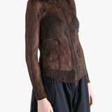 Brown shirt worn by a person, showing the shirt fit