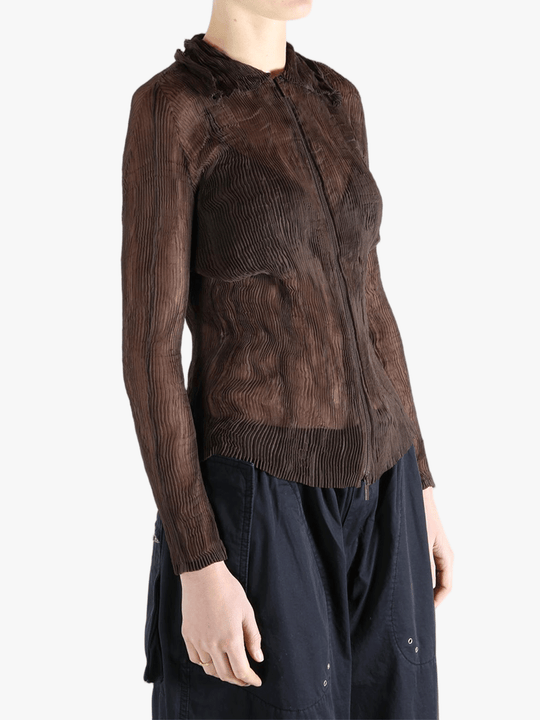 Brown shirt worn by a person, showing the shirt fit