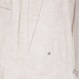 Close up of tan pants, showing texture of the cotton fabric