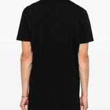 Black t-shirt worn by a person, showing the t-shirt's fit