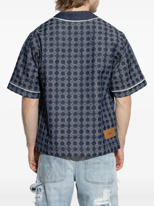 Blue shirt worn by a person, showing the shirt's fit