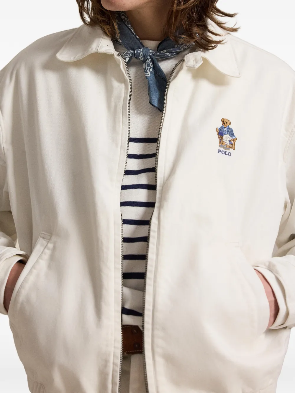 Close up of White coat, showing texture of the cotton fabric