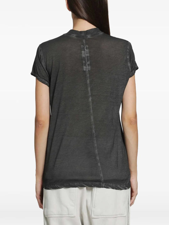 Black t-shirt worn by a person, showing the t-shirt fit