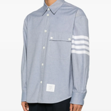 blue shirt worn by a person, showing the shirt fit