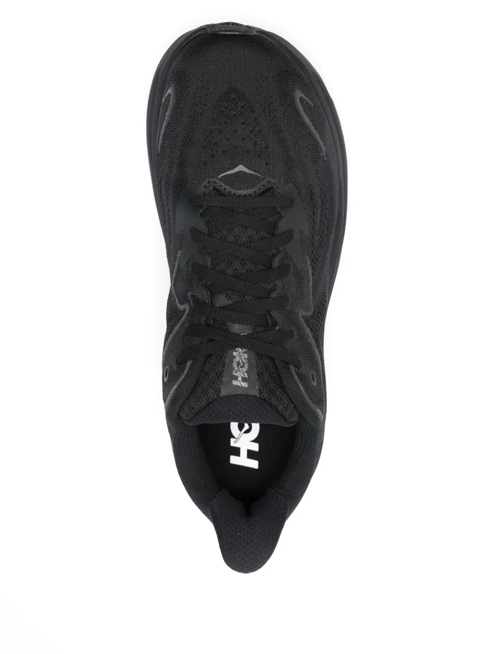 Black sneakers, vertical view