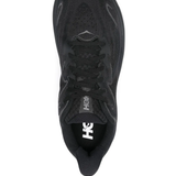 Black sneakers, vertical view