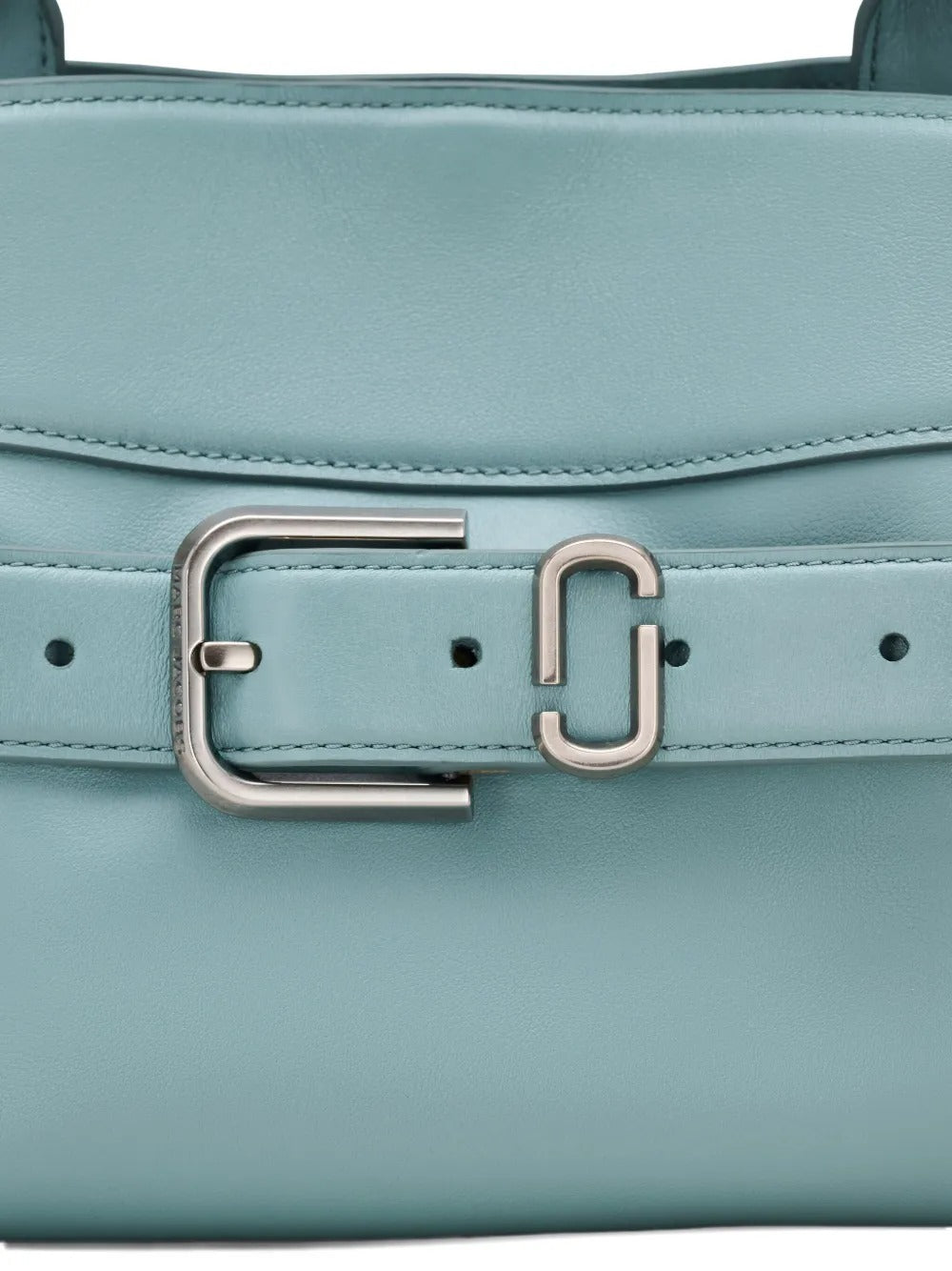 Close up of the blue bag, showing texture of the leather fabric
