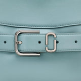 Close up of the blue bag, showing texture of the leather fabric