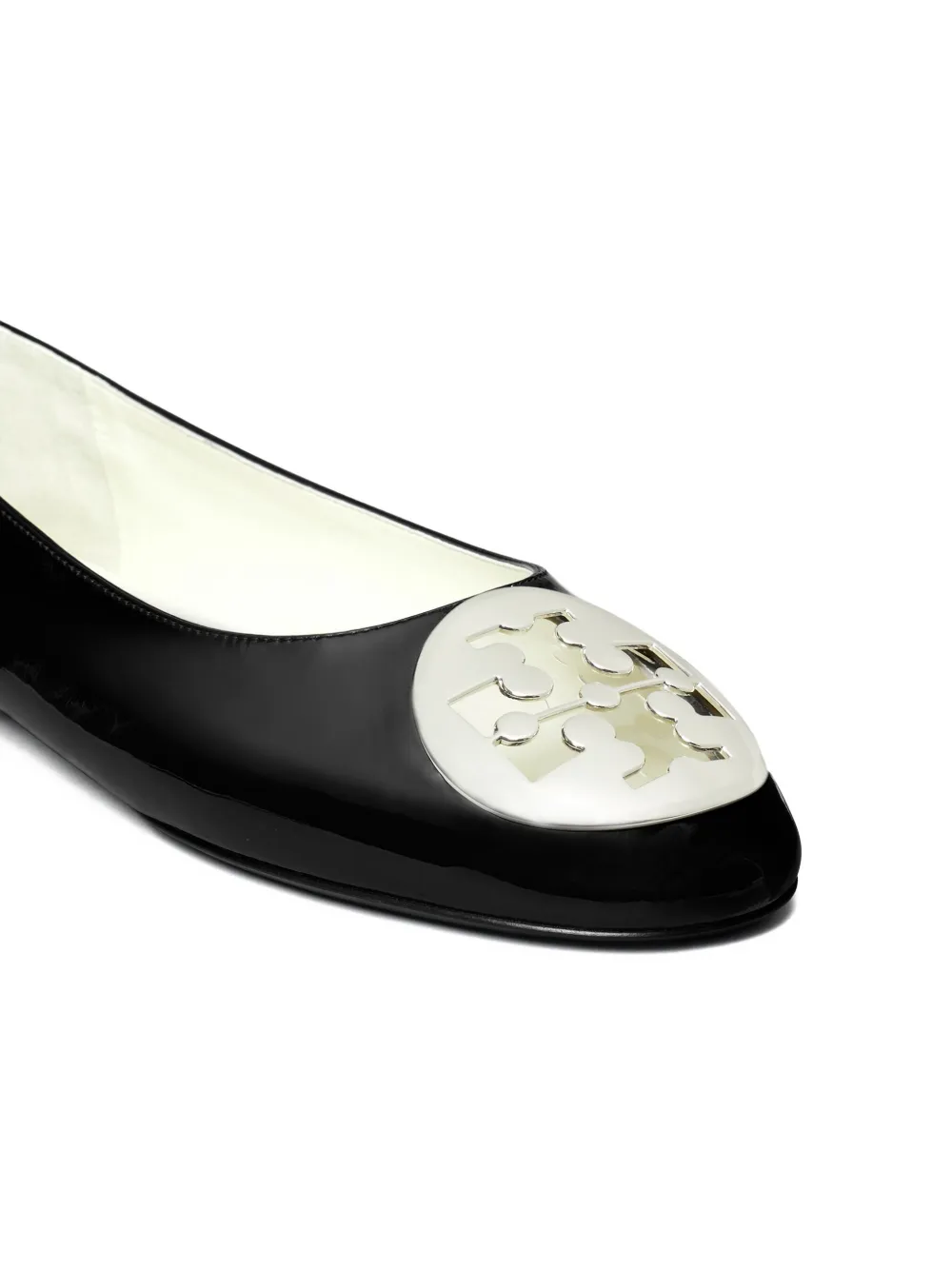 Close up of black flat shoe,showing texture of the rubber fabric