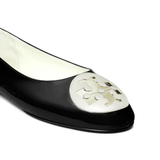 Close up of black flat shoe,showing texture of the rubber fabric