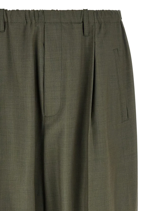 Close up of Green pants, showing texture of the 100% virgin fabric
