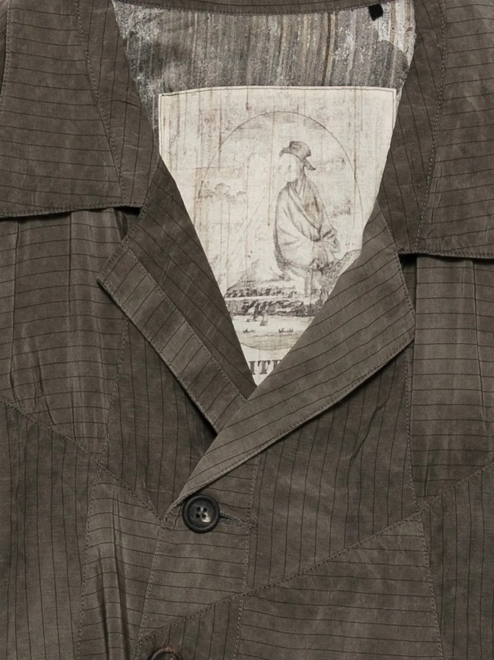 Close up of brown jacket, showing texture of the viscose fabric