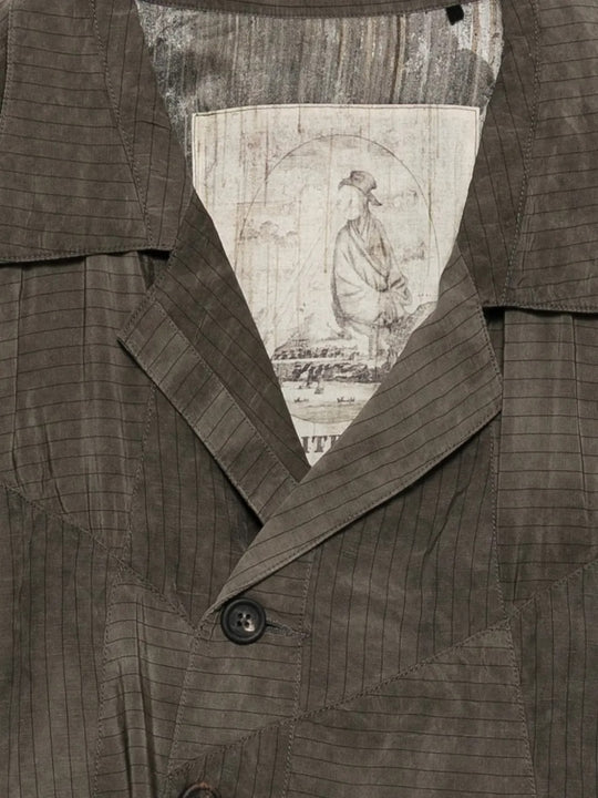 Close up of brown jacket, showing texture of the viscose fabric