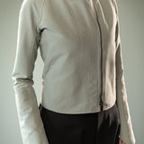 Close up of grey jacket, showing texture of the fabric