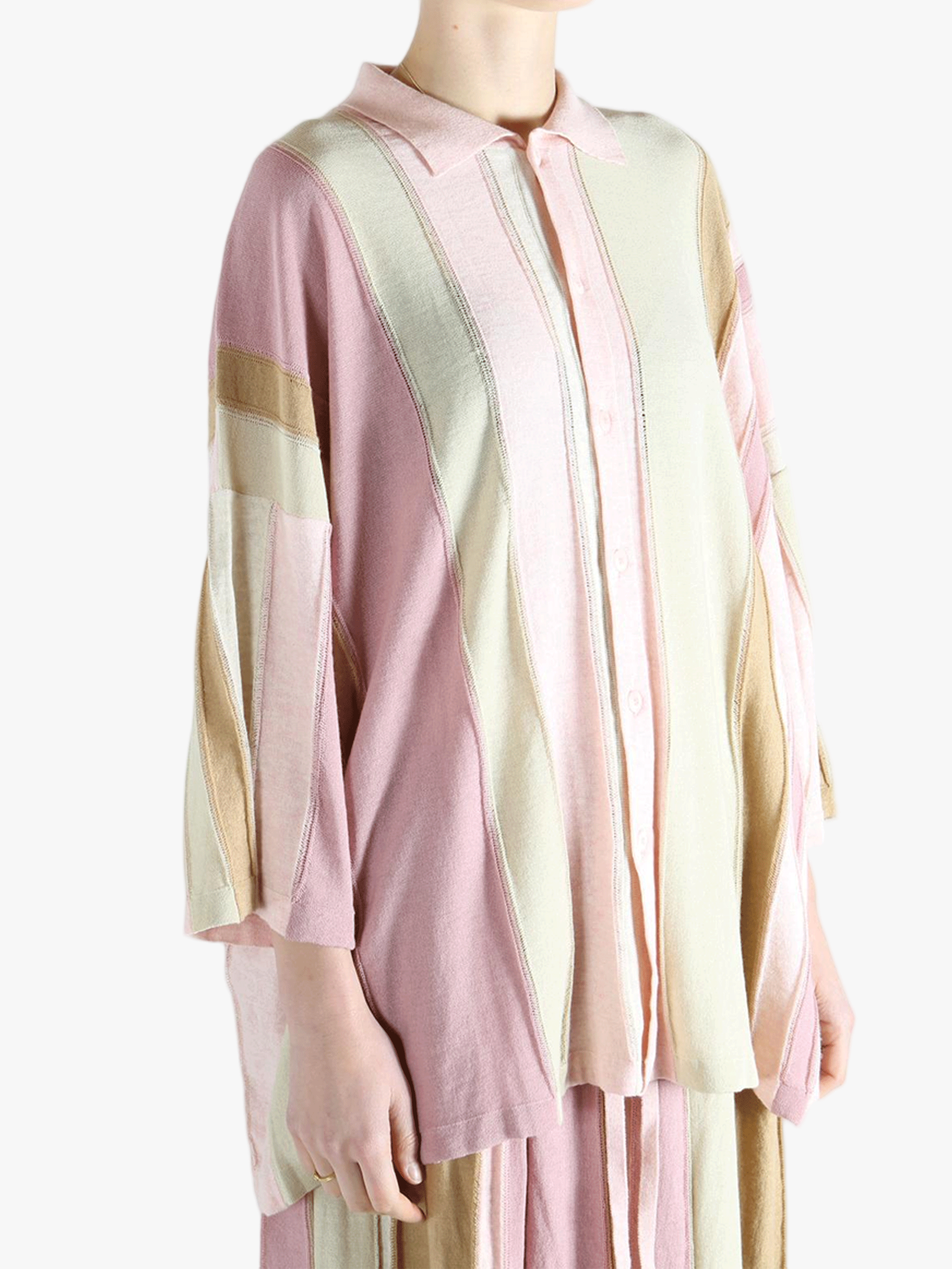 Pink shirt worn by a person, showing the shirt's fit