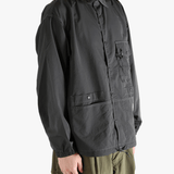 Black jacket worn by a person, showing the  jacket's fit