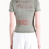 Green t-shirt worn by a person, showing the t-shirt fit
