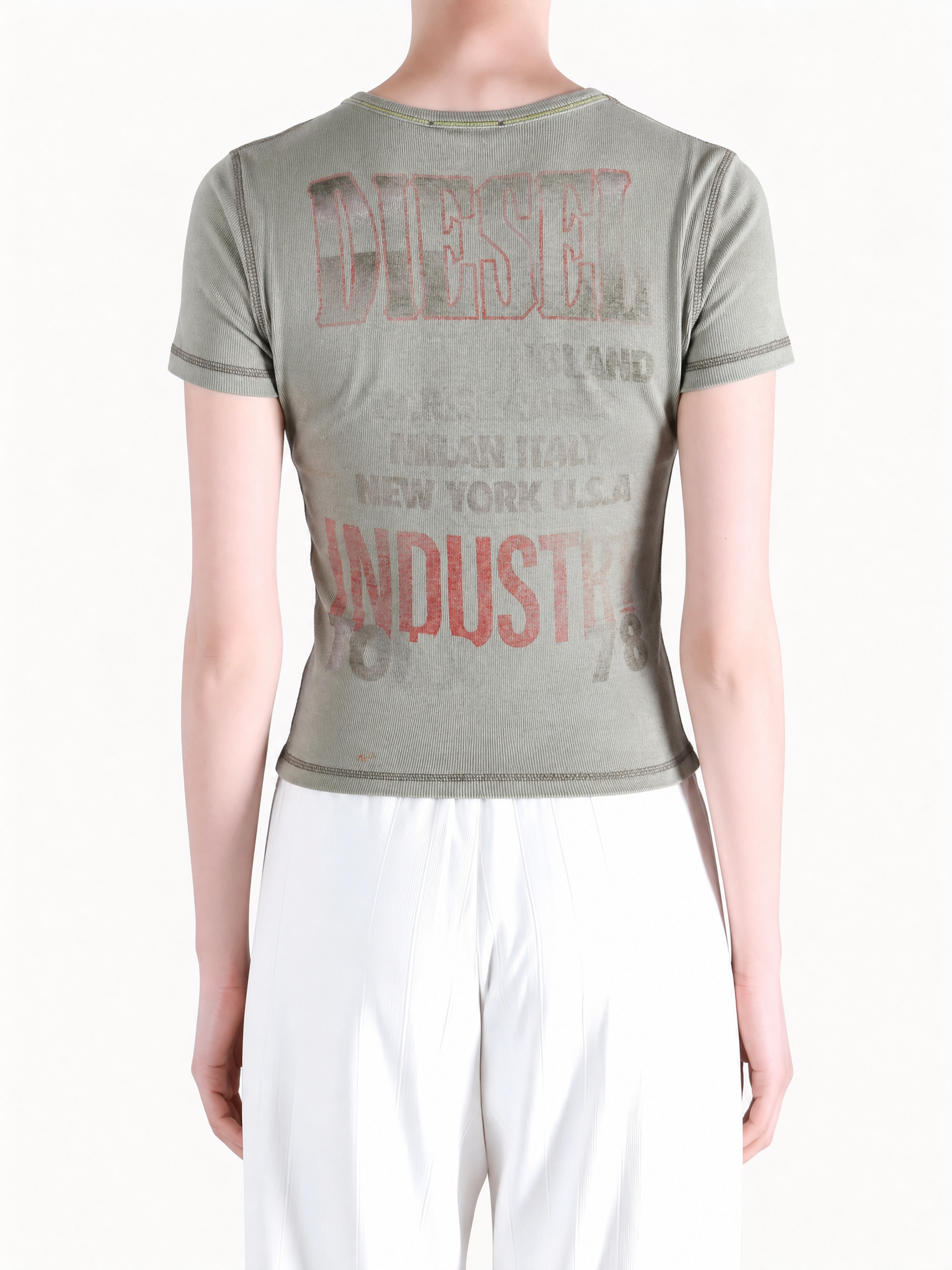 Green t-shirt worn by a person, showing the t-shirt fit