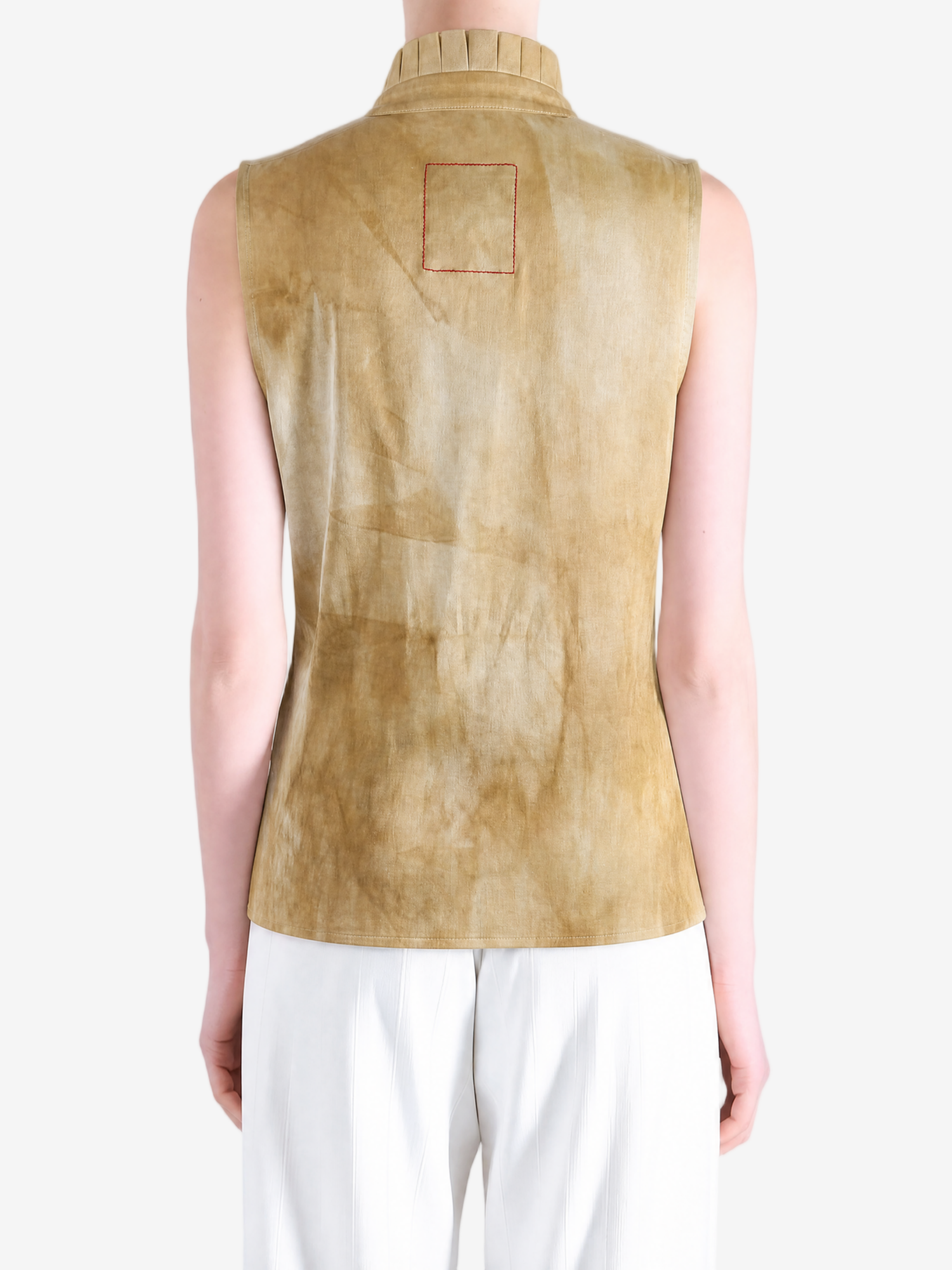Tan top worn by a person, showing the top fit