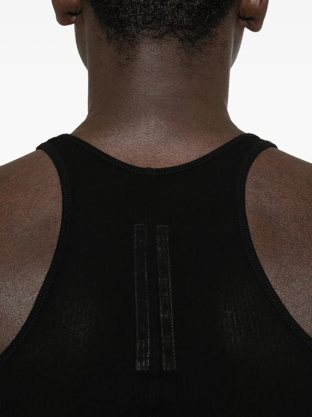 Close up of black tops, showing texture of the viscose and silk fabric