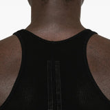 Close up of black tops, showing texture of the viscose and silk fabric