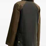 Brown jacket worn by a person, showing the jacket fit