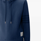 Close up of navy hoodie, showing texture of the Cotton fabric