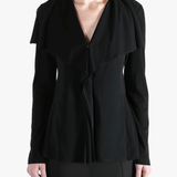 Black jackets worn by a person, showing the jackets fit