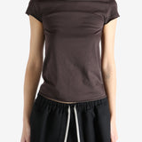 Brown shirt worn by a person, showing the shirt fit