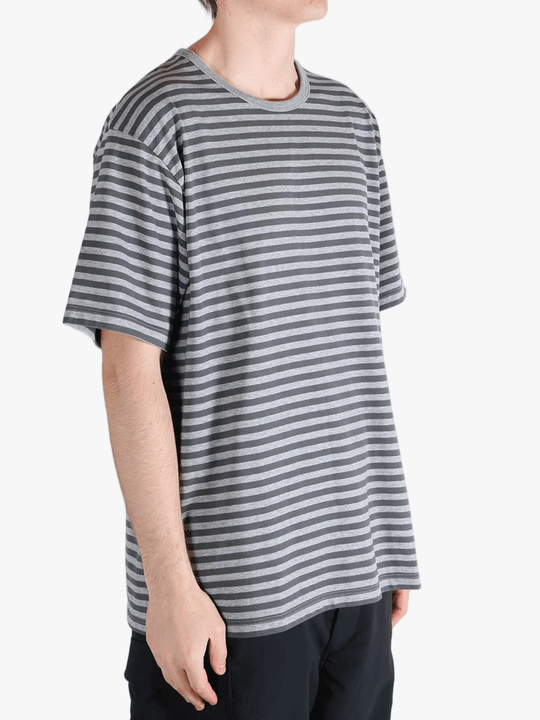 Grey t-shirt worn by a person, showing the t-shirt fit