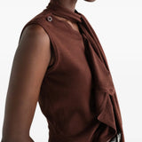 Brown top worn by a person, showing the top fit