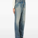 Close up of the blue jeans, showing texture of the cotton fabric