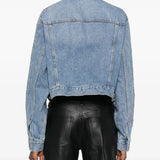 Blue jacket worn by a person, showing the jacket's fit